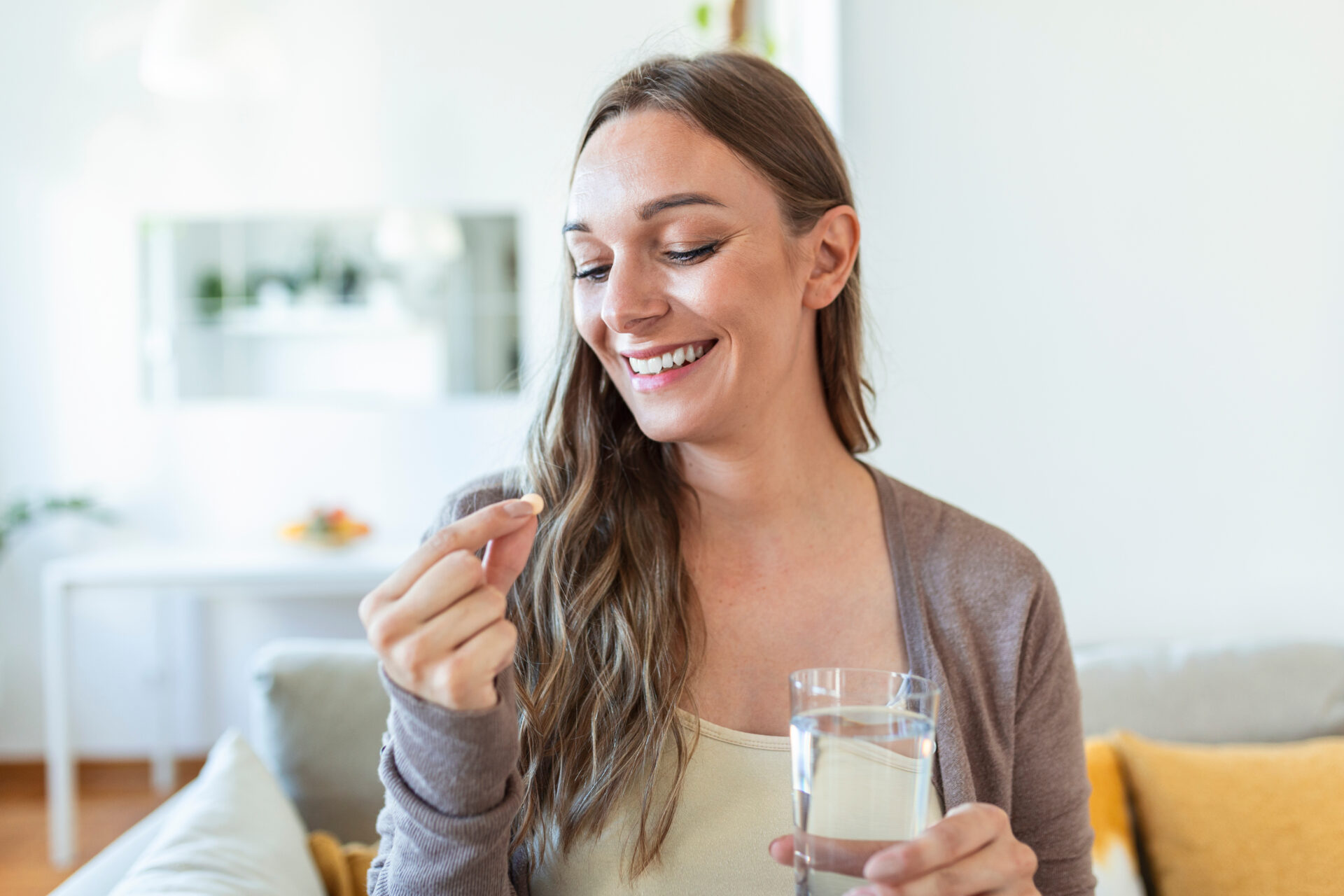 Head Shot Portrait Happy Woman Holds Pill Glass Of Water, Takes Daily Medicine Vitamin D, Omega 3 Supplements, Skin Hair Nail Strengthen And Beauty, Medication For Health Care Concept